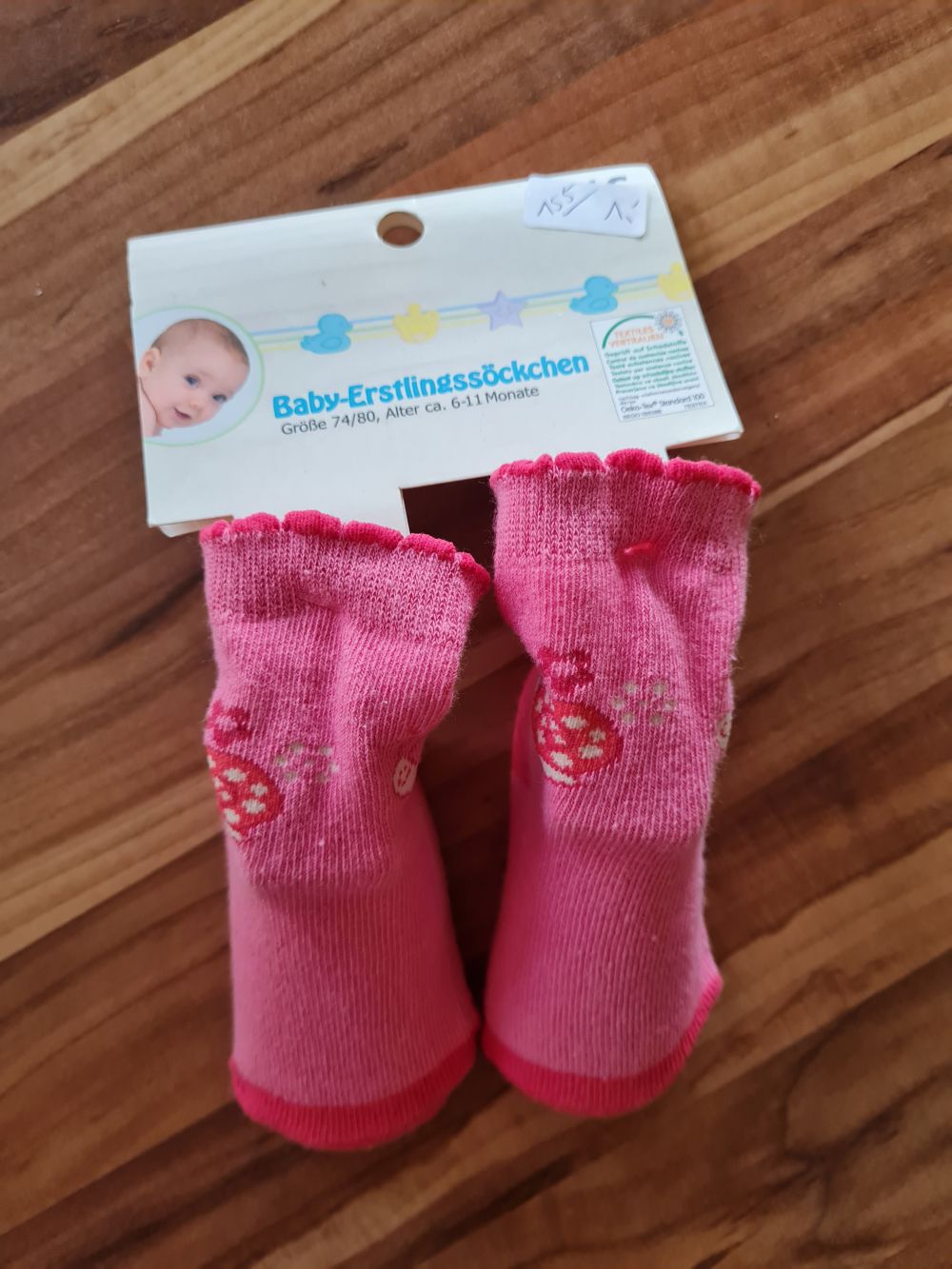 Baby-Erstlingssöckchen, Gr. 74/80, rosa, Neuware mit Etikett