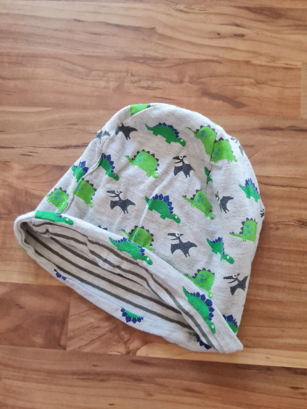 Wendemütze "Dinos", Gr. 44 (5-6 Monate), Secondhand