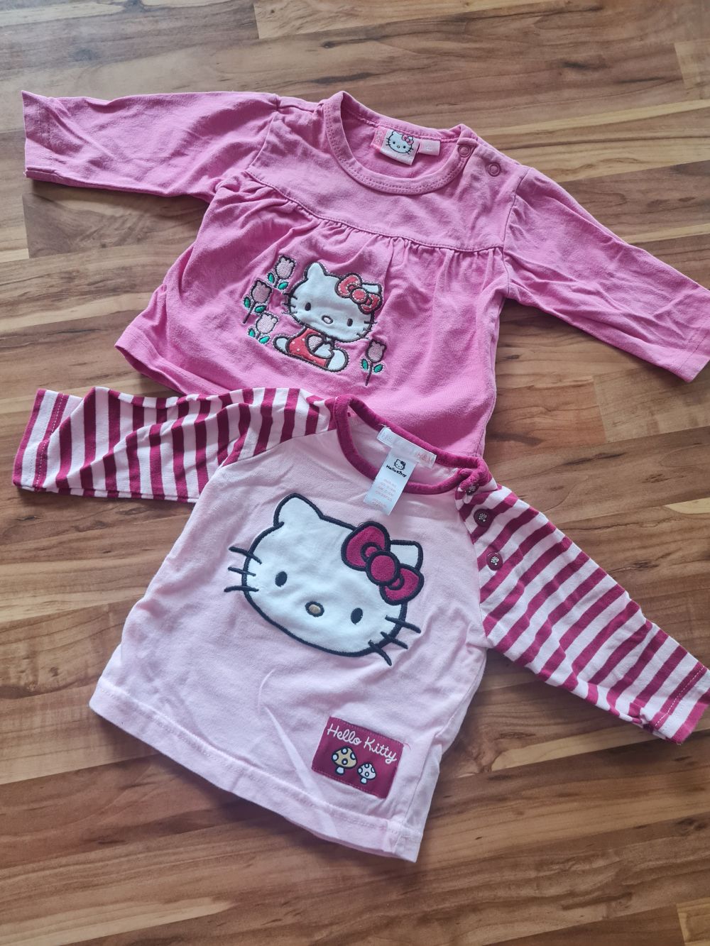 2 Langarmshirts "Hello Kitty", Gr. 62, Secondhand
