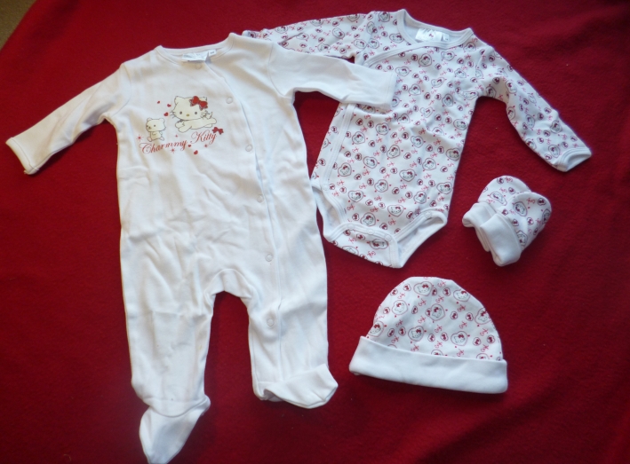 5-teiliges Baby-Set mit Charmmy Kitty-Muster weiß u. rot - Gr. 56, Neuware